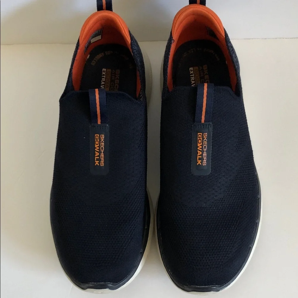 Skechers Slip-On GoWalk Men’s Knit sneakers in Navy with Orange Trim